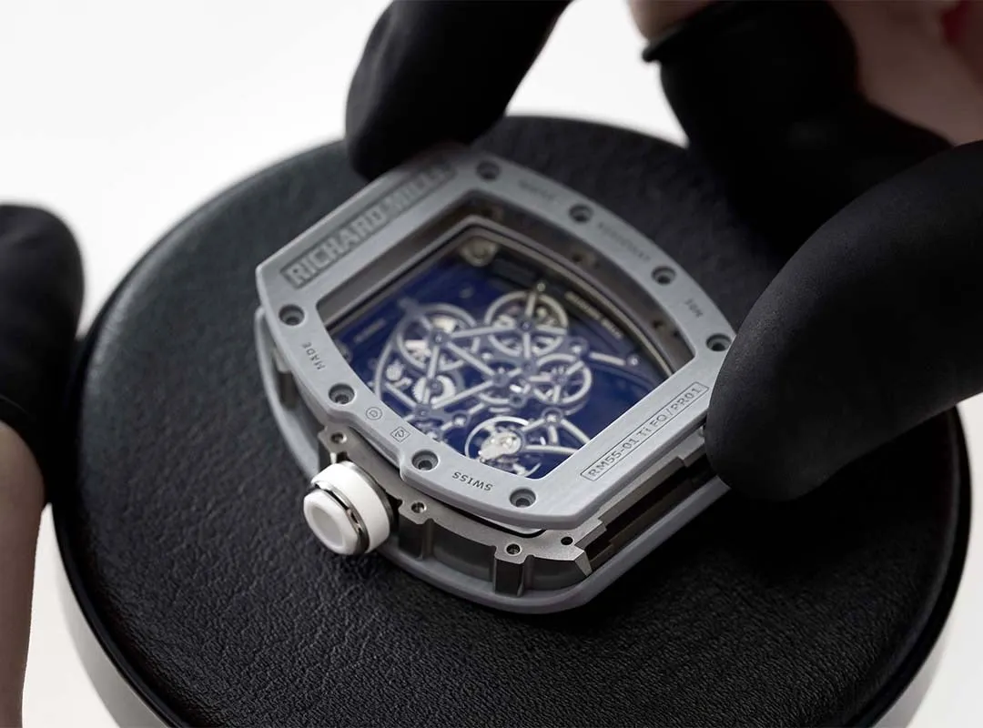 Richard Mille original vs fake comparison showing case materials, movement details, and replica watch differences