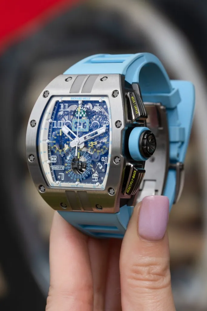 Best Richard Mille RM 011 replica comparison showing tonneau case shape, dial details, screws, and luxury watch features